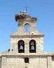 A storks' nest on a church, in the north of Spain.