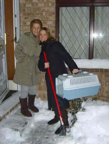 Chris & her Mum fighting the snow, after bringing their 8 cats from Mallorca to Barnsley!