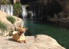Juli enjoying a break beside a waterfall in Alicante.