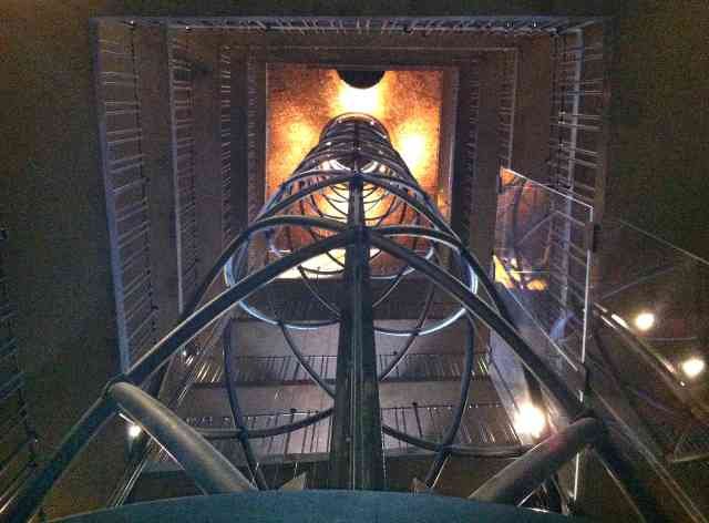 Walking up the stairs, inside the old clock tower in Prague.