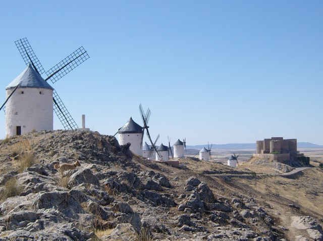 Windmills and castle at Consuegra, near Toledo in central Spain.