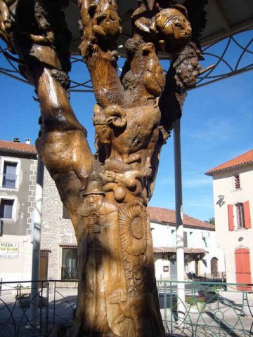 Interesting tree-carvings in the village square of Le Caylar in France.