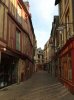 A quiet street, just after dawn, in historic Le Mans, France,.